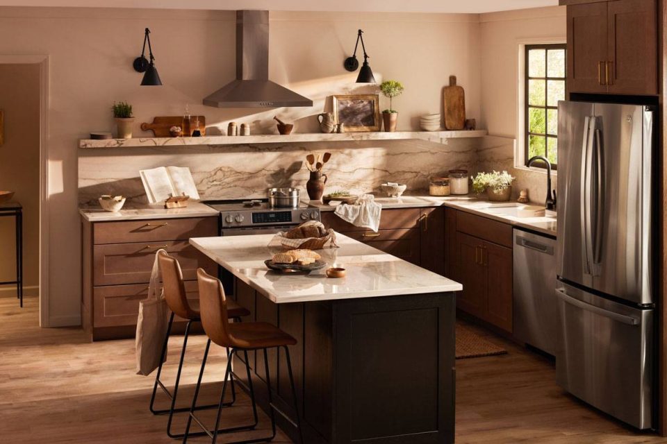 Photograph of modern kitchen interior with dramatic lighting and props.