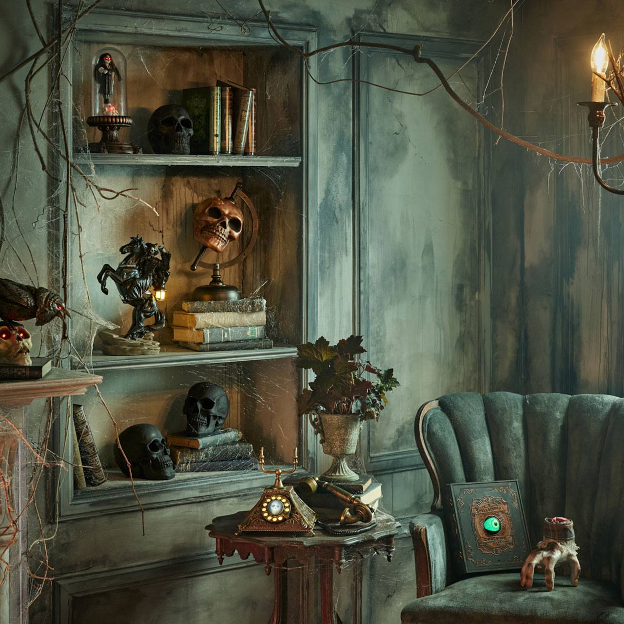 A dimly lit, eerie room with shelves holding skulls, vases, and books. A vintage chair sits beside a table with an old rotary phone and mystical objects. Bare branches and dim lighting enhance the haunted atmosphere.