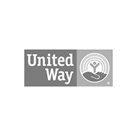 Logo of United Way, featuring a gray square with "United Way" text on the left and an image on the right depicting a hand holding a person with circular lines above, symbolizing support and community.