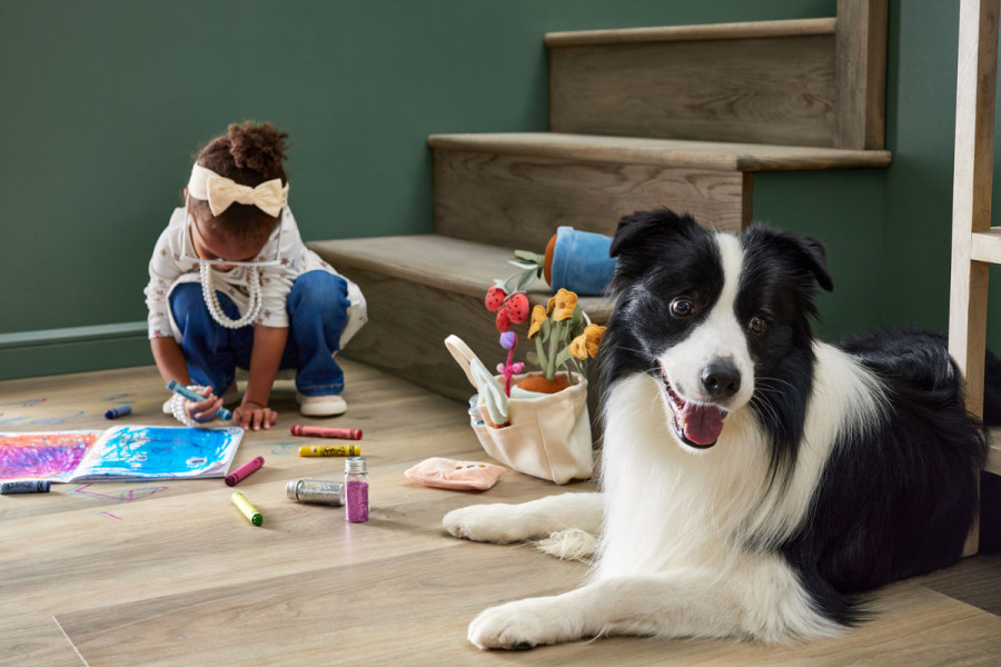 Lifestyle photography of interior room with girl playing.